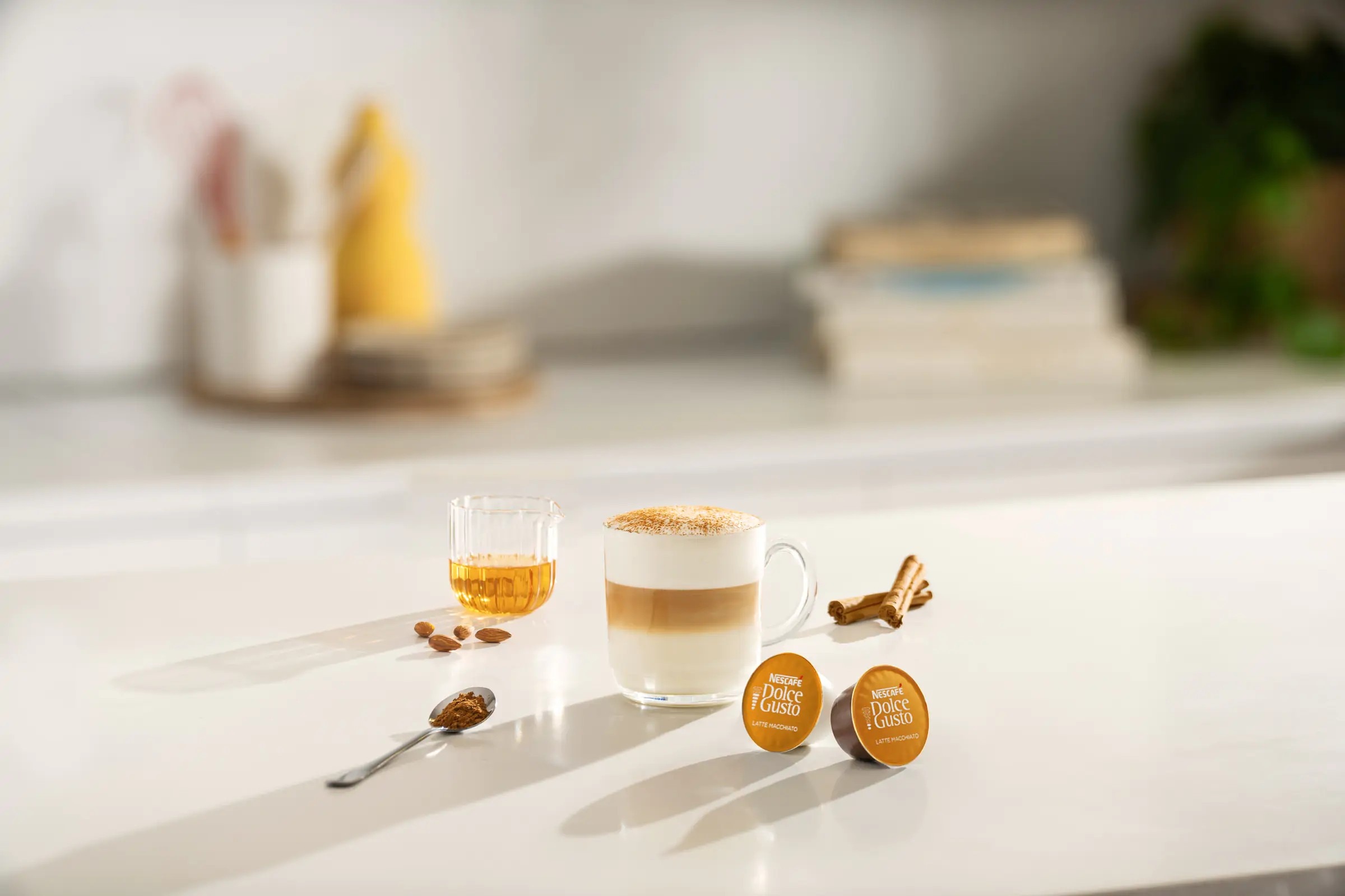 Amaretto Hot Latte Macchiato coffee recipe prepared with NESCAFÉ® Dolce Gusto® Latte Macchiato